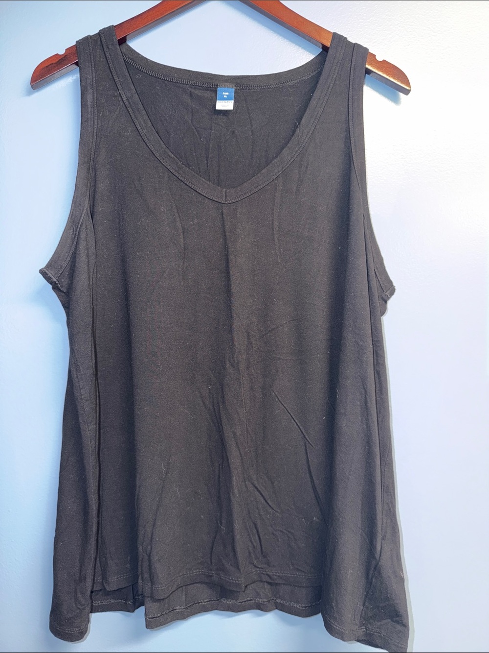 Old Navy Black V-Neck Tank Top. Bad lighting.  No fading.  No stains